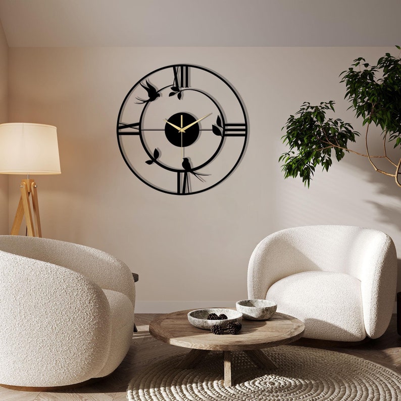 Horloge murale creuse simple et abstraite en métal noir en forme d'oiseau