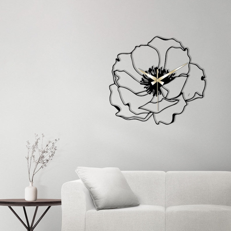 Horloge murale creuse en métal avec motif de fleurs noires en fleurs